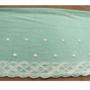 dentelle bleue ciel surbrodée blanche jersey 15 cm