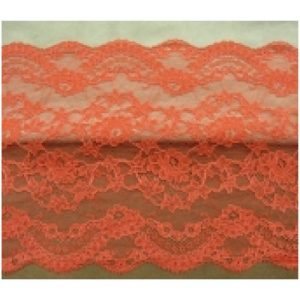 DENTELLE DE CALAIS rose saumoné motif floral dentelé sur les 2 bordures 18 cm
