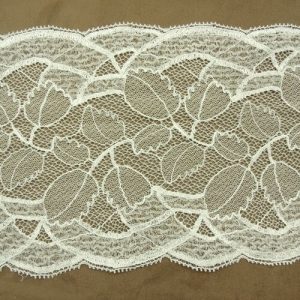 DENTELLE DE CALAIS STRETCH ivoire motif feuilles dentelé sur les 2 bordure 20 cm
