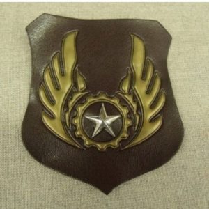 écusson militaire à coudre sur fond skai marron , largeur 7cm sur hauteur de 8cm