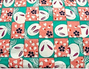 tissu coton imprimé lapin rose et vert