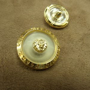 BOUTON doré sur fond transparent