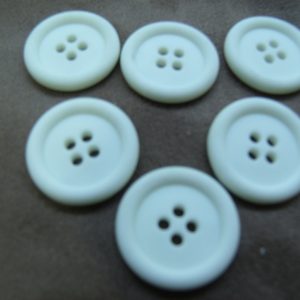 bouton acrylique blanc à 4 trous