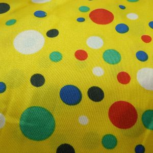 tissu satin jaune à pois multicolore