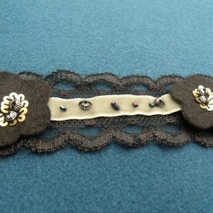 ruban fantaisie rond noir garni gris avec strass