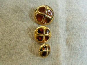 bouton orange et or