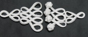 bouton brandebourg blanc