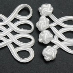 bouton brandebourg blanc