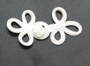 bouton brandebourg blanc
