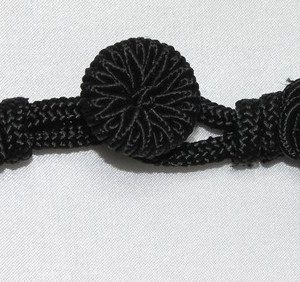 Bouton brandebourg noir