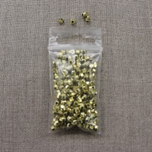 PERLES ACRYLIQUES A FACETTE 4 MM- doré