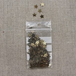 SEQUIN en forme d' étoiles métallisées - doré