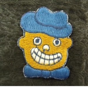 écusson thermocollant MOTIF: bonhomme souriant bleu et marron largeur 3cm sur hauteur 5cm