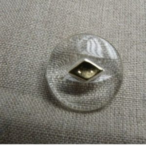 bouton acrylique a queue garnit métal bleu transparent et or ,23 mm,de belle qualité