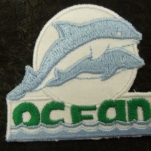 écusson thermocollant motif: DAUPHIN / OCEAN gris & vert 4 cm