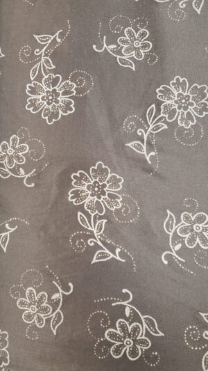 tissu polyester noir stretch avec imprimé fleur grise avec incrustation lurex or