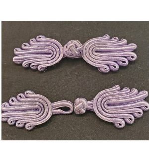 BOUTON BRANDEBOURG parme violet longueur de11cm sur la largeur de 4cm