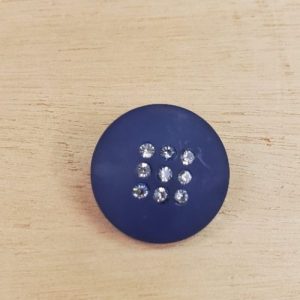 bouton incrusté de petits strass 23 mm
